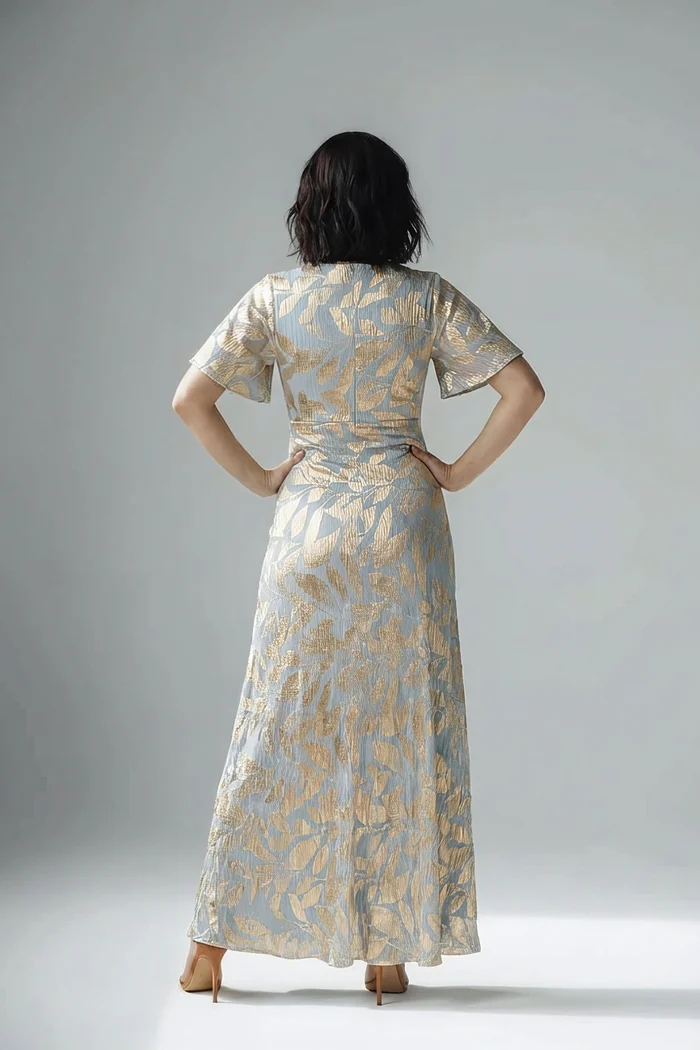 Foil Leaf Short Sleeve in Light Blue Gold Gown With Draped Details by Adrianna Papell