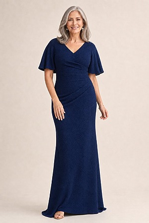 Catherine Flutter Sleeve Navy Gown by Trellis Lane mother of the bride dress on model
