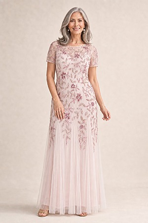 Hand Beaded Blush Pink Short Sleeve Floral Godet Gown by Adrianna Papell mother of the bride dress on model
