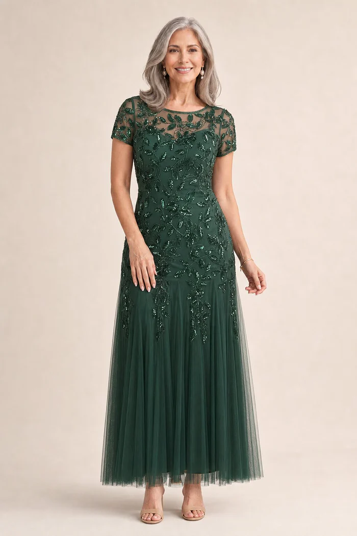 Hand Beaded Emerald Short Sleeve Floral Godet Gown by Adrianna Papell mother of the bride dress on model