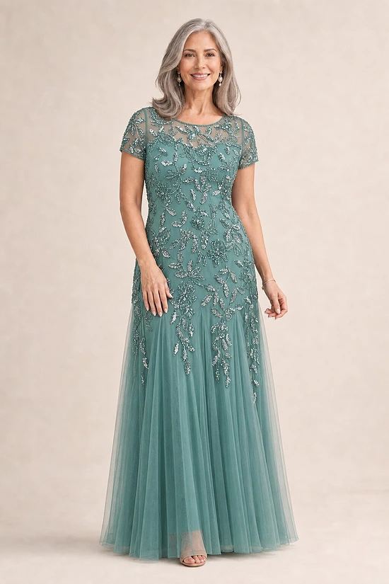 Hand Beaded Jade Short Sleeve Floral Godet Gown by Adrianna Papell mother of the bride dress on model