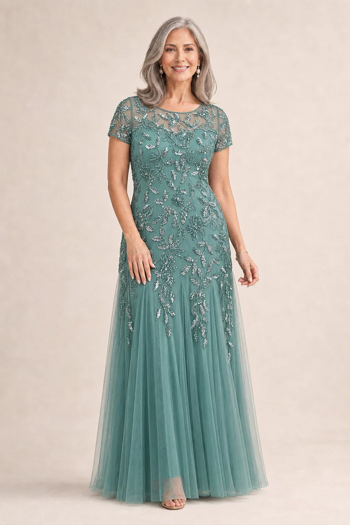 Hand Beaded Jade Short Sleeve Floral Godet Gown by Adrianna Papell mother of the bride dress on model