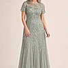 Hand Beaded Sage Green Short Sleeve Floral Godet Gown by Adrianna Papell mother of the bride dress on model