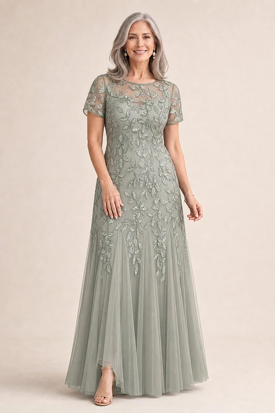 Hand Beaded Sage Green Short Sleeve Floral Godet Gown by Adrianna Papell mother of the bride dress on model