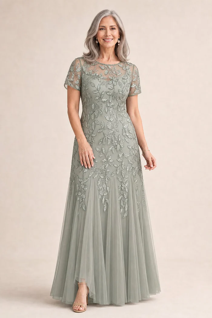 Hand Beaded Sage Green Short Sleeve Floral Godet Gown by Adrianna Papell mother of the bride dress on model