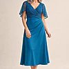 Joyce Flared Teal Midi Refined Glamour in a Flattering Silhouette by Trellis Lane mother of the bride dress on model