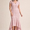 Stasia Hi-Lo Blush Dress Understated Shine in a Mermaid Silhouette by Trellis Lane mother of the bride dress on model