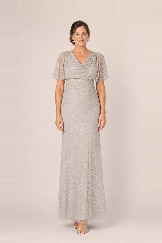 Crystal silver hand-beaded cowl neck gown with short flutter sleeves, front view, worn by a mother of the groom