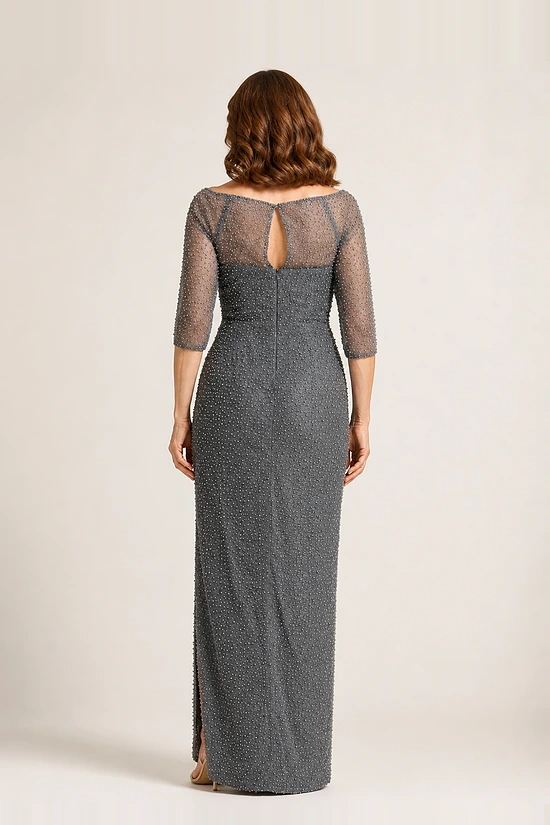 Back view of the charcoal pearl-beaded pencil gown showing the sheer illusion back, keyhole opening and centre back zip
