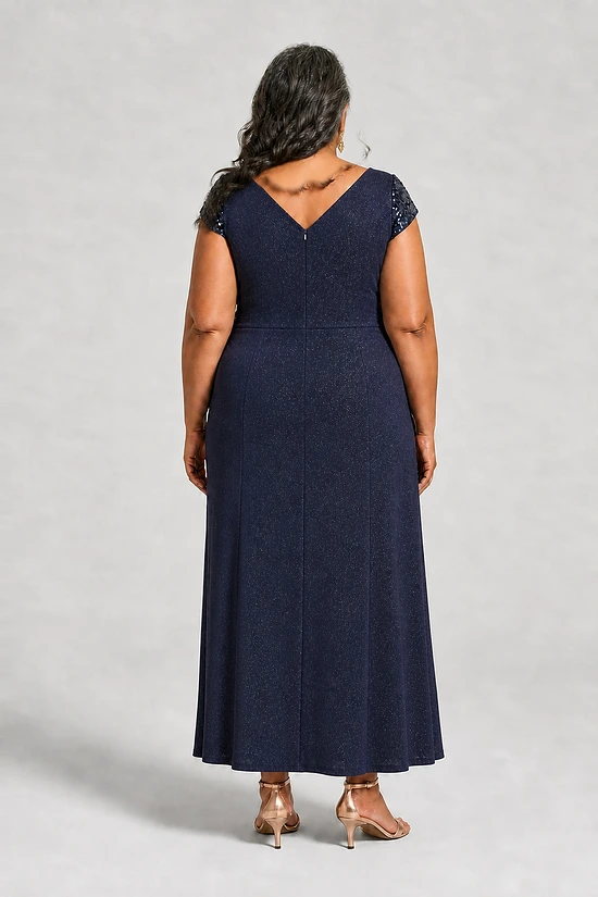 Delphine navy glitter knit gown back view showing the V back and A-line skirt