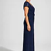 Side view of the Delphine navy twist-waist glitter knit gown by Dressology on a regular size model