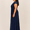 Delphine navy glitter knit gown side view showing the twist waist and sequin godet