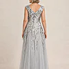Back view of the silver glitter embroidered gown showing the V-shaped back and the soft trumpet tulle skirt, worn by a mother of the bride