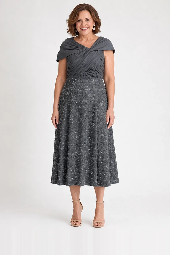 Charcoal grey pearl-beaded A-line midi dress with a draped crossover portrait neckline and cap sleeve coverage, front view, worn by a mother of the groom