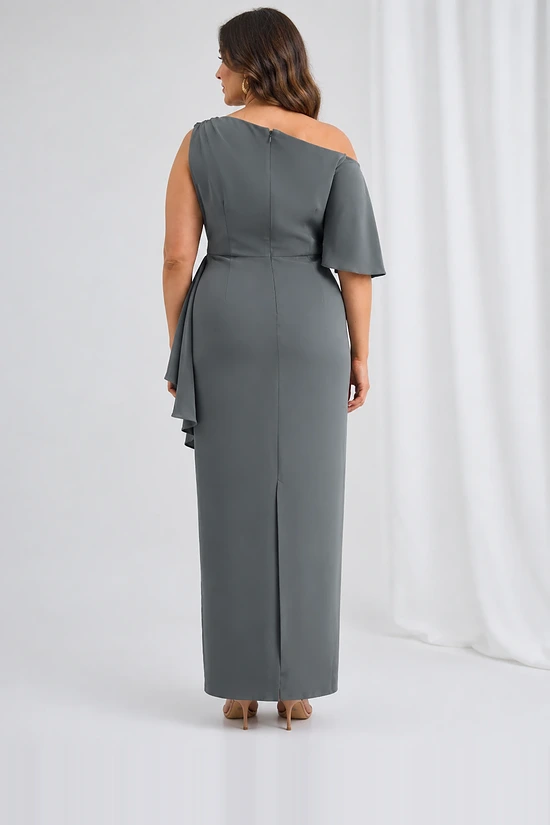 Back view of the charcoal one-shoulder gown showing the concealed centre back zip and the walking split at the hem