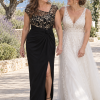 Mother and bride at a coastal garden wedding, wearing Charlotte Black and Gold gown by Dressology