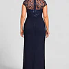 Navy knotted crepe column gown, back view showing the embroidered mesh yoke and centre-back zip, worn by a plus-size mother of the bride