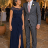 Mother and groom at an outdoor wedding, wearing the Charlotte Navy gown by Dressology