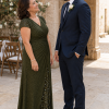 Mother and groom at an outdoor wedding, wearing the Delphine Olive gown by Dressology