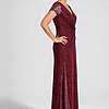 Delphine burgundy glitter knit gown side view showing the twist waist and sequin godet