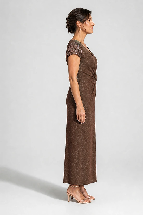Side view of the Delphine chocolate brown twist-waist glitter knit gown by Dressology on a regular size model