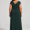 Back view of the Delphine emerald green twist-waist glitter knit gown by Dressology showing the deep V back and plain A-line skirt