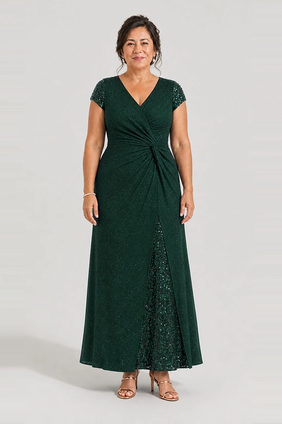 Delphine emerald green glitter knit gown by Dressology shown on a regular size model, front view