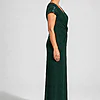 Side view of the Delphine emerald green twist-waist glitter knit gown by Dressology on a regular size model