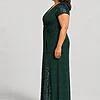 Delphine emerald green glitter knit gown side view showing the twist waist and sequin godet