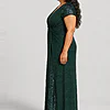 Delphine emerald green glitter knit gown side view showing the twist waist and sequin godet