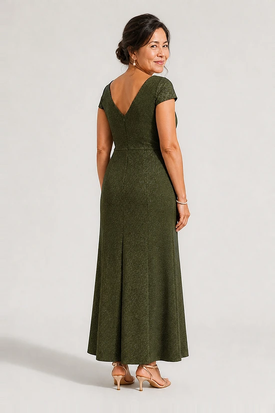 Back view of the Delphine olive green twist-waist glitter knit gown by Dressology showing the V back and plain A-line skirt