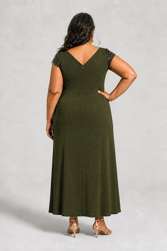 Back view of the Delphine olive green twist-waist glitter knit gown by Dressology on a plus size model showing the V back and A-line skirt