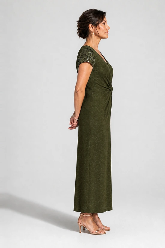 Delphine olive green glitter knit gown side view showing the twist waist and sequin godet