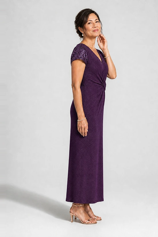 Delphine purple glitter knit gown side view showing the twist waist and sequin godet