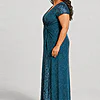 Side view of the Delphine teal twist-waist glitter knit gown by Dressology on a plus size model