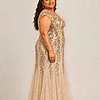Champagne-gold Sylvie gown by Dressology on a plus-size model, side view
