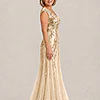 Side view of the champagne-gold Sylvie gown by Dressology with cap sleeves and soft trumpet tulle skirt