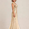 Side view of the champagne-gold Sylvie gown by Dressology with cap sleeves and soft trumpet tulle skirt
