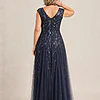 Back view of the navy glitter embroidered gown showing the V-shaped back and the soft trumpet tulle skirt, worn by a mother of the bride